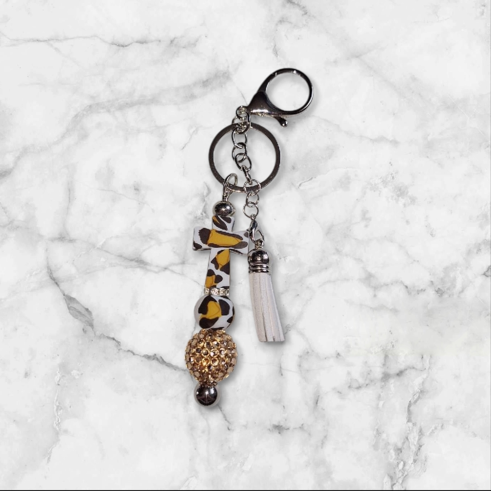 Leopard Print Cross Keychain with Gold and White Accents